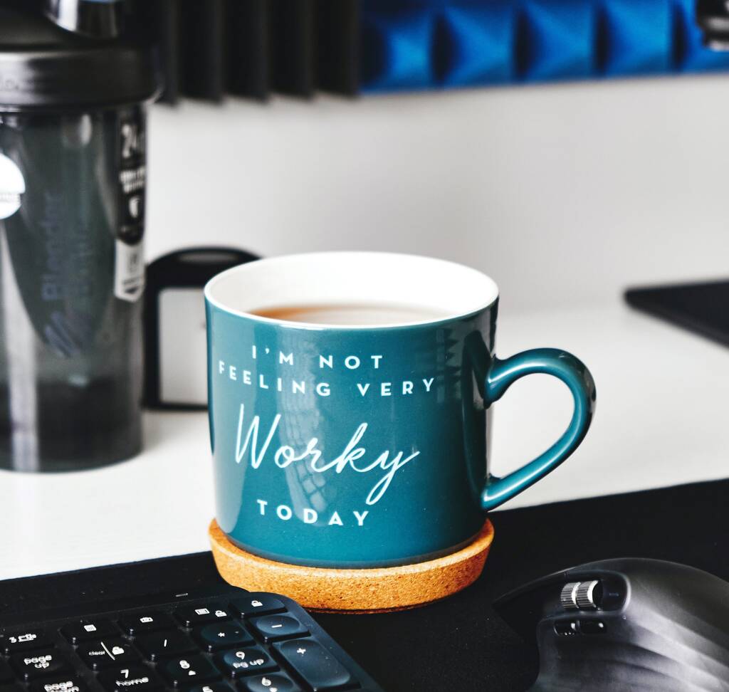 blue mug with 'I'm not feeling very worky today' written on 